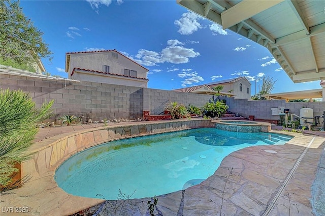 1025 Clover Tip Ct, Las Vegas, NV 89123 - view of pool with a fenced backyard, a patio area, and a pool with connected hot tub