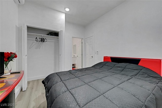 1025 Clover Tip Ct, Las Vegas, NV 89123 - bedroom featuring wood finished floors, a closet, recessed lighting, and baseboards