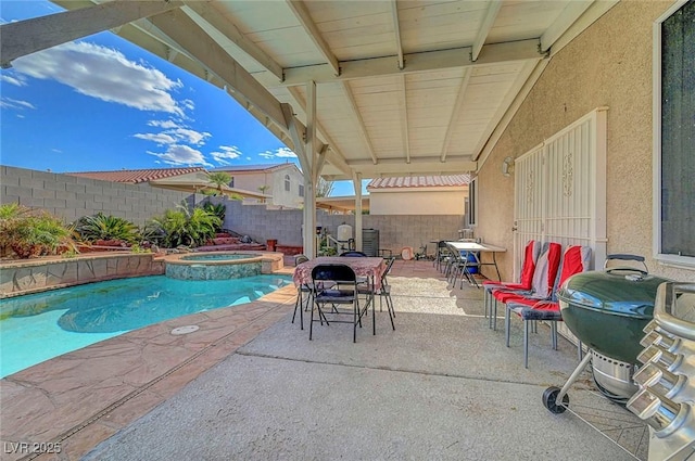 1025 Clover Tip Ct, Las Vegas, NV 89123 - view of pool with a fenced backyard, a patio, a pool with connected hot tub, outdoor dining space, and grilling area