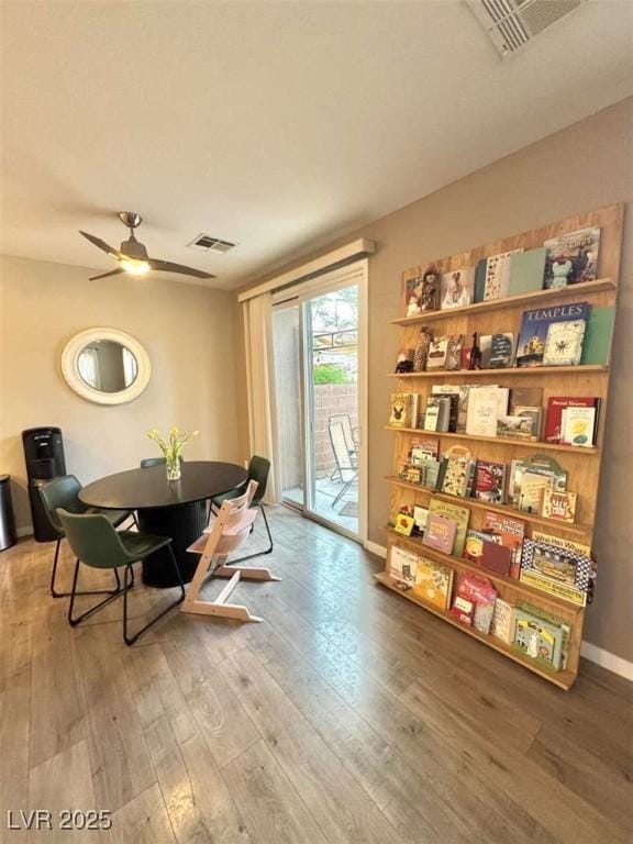 1355 Grass Creek Ave Unit 1, Henderson, NV 89012 - dining space with hardwood / wood-style flooring, ceiling fan, and baseboards