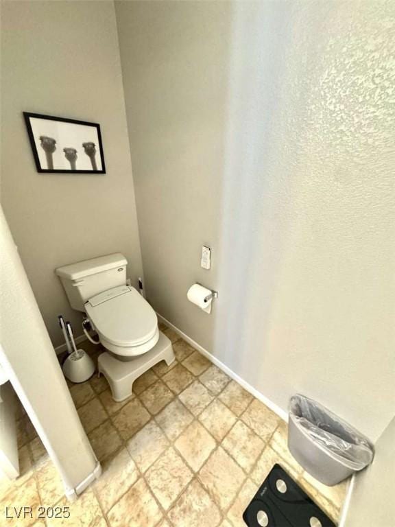 1355 Grass Creek Ave Unit 1, Henderson, NV 89012 - bathroom featuring toilet and baseboards