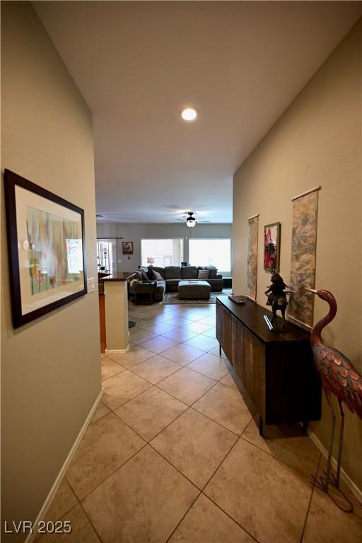 7727 Widewing Dr, North Las Vegas, NV 89084 - hallway with light tile patterned flooring, recessed lighting, and baseboards