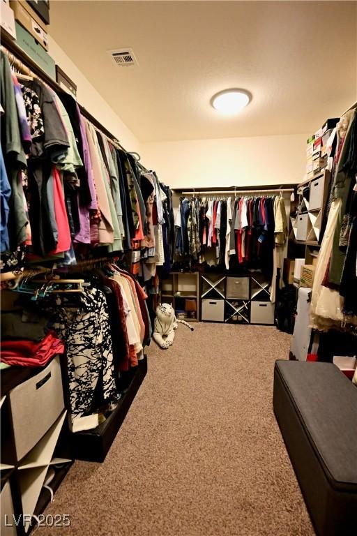 7727 Widewing Dr, North Las Vegas, NV 89084 - spacious closet featuring carpet flooring