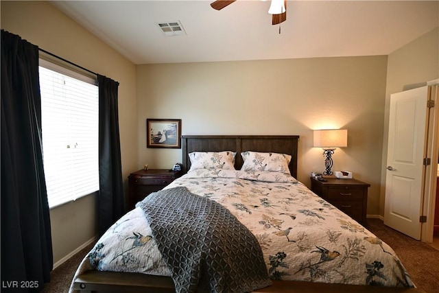 7727 Widewing Dr, North Las Vegas, NV 89084 - bedroom with dark carpet, baseboards, multiple windows, and a ceiling fan