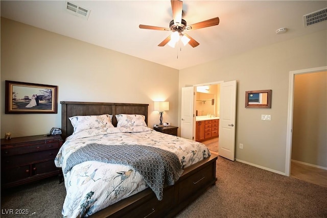 7727 Widewing Dr, North Las Vegas, NV 89084 - carpeted bedroom with baseboards, ensuite bathroom, and ceiling fan
