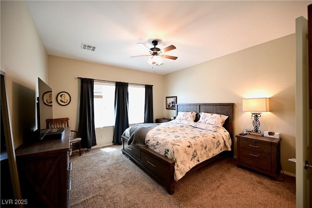 7727 Widewing Dr, North Las Vegas, NV 89084 - bedroom featuring light carpet and a ceiling fan
