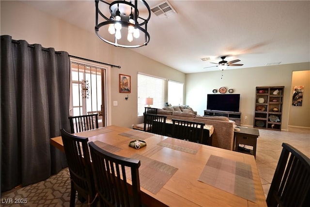 7727 Widewing Dr, North Las Vegas, NV 89084 - dining space with a chandelier, plenty of natural light, light tile patterned flooring, and ceiling fan