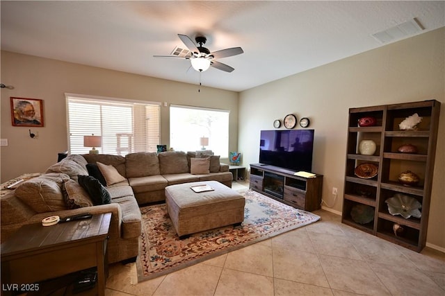 7727 Widewing Dr, North Las Vegas, NV 89084 - living area with a ceiling fan and light tile patterned floors