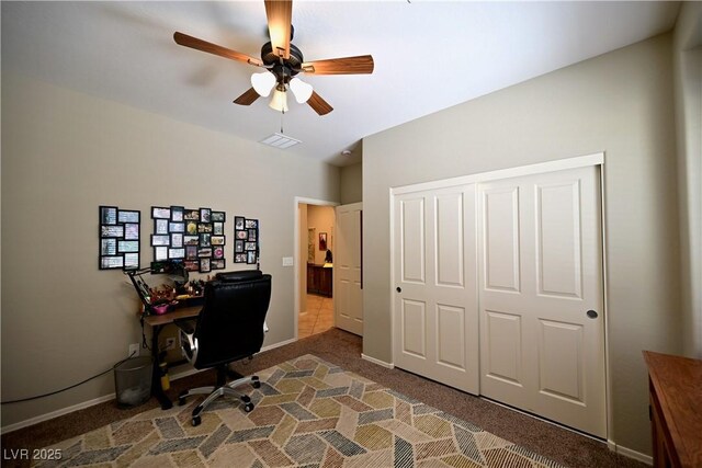 7727 Widewing Dr, North Las Vegas, NV 89084 - home office with carpet flooring, ceiling fan, and baseboards