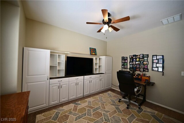 7727 Widewing Dr, North Las Vegas, NV 89084 - carpeted office with a ceiling fan and baseboards