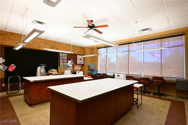 7727 Widewing Dr, North Las Vegas, NV 89084 - office area with ceiling fan and a drop ceiling