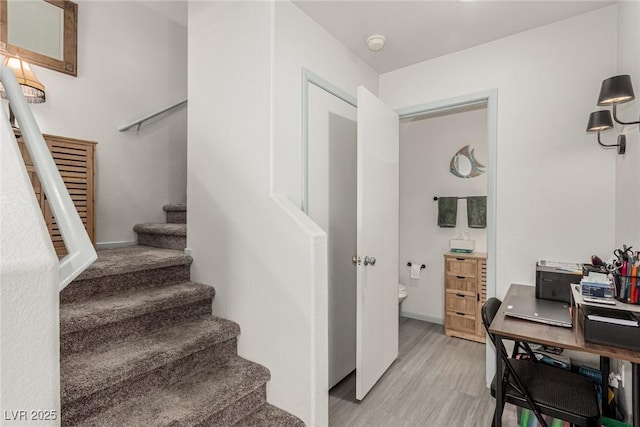 4249 Fleet Dancer St, Las Vegas, NV 89129 - stairway featuring wood finished floors
