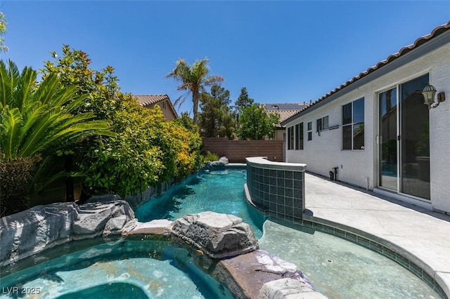3336 Hidden Ridge St, Las Vegas, NV 89129 - view of pool with a fenced backyard, central air condition unit, a pool with connected hot tub, and a patio area