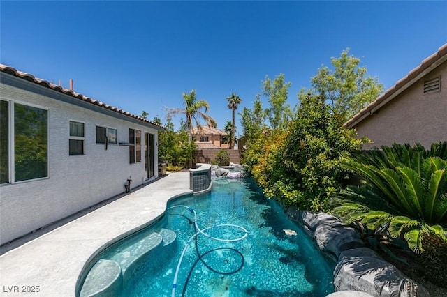 3336 Hidden Ridge St, Las Vegas, NV 89129 - view of swimming pool featuring a patio area, a fenced backyard, and central AC