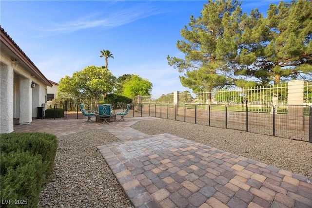 5020 Linkside Dr, Las Vegas, NV 89130 - fenced backyard with a patio area