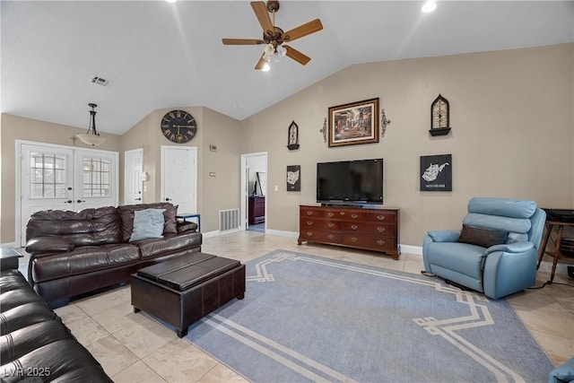 5020 Linkside Dr, Las Vegas, NV 89130 - living room with vaulted ceiling, a ceiling fan, light tile patterned floors, baseboards, and french doors