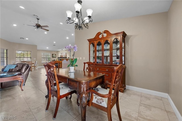 5020 Linkside Dr, Las Vegas, NV 89130 - dining room with baseboards, a ceiling fan, recessed lighting, a chandelier, and light tile patterned floors