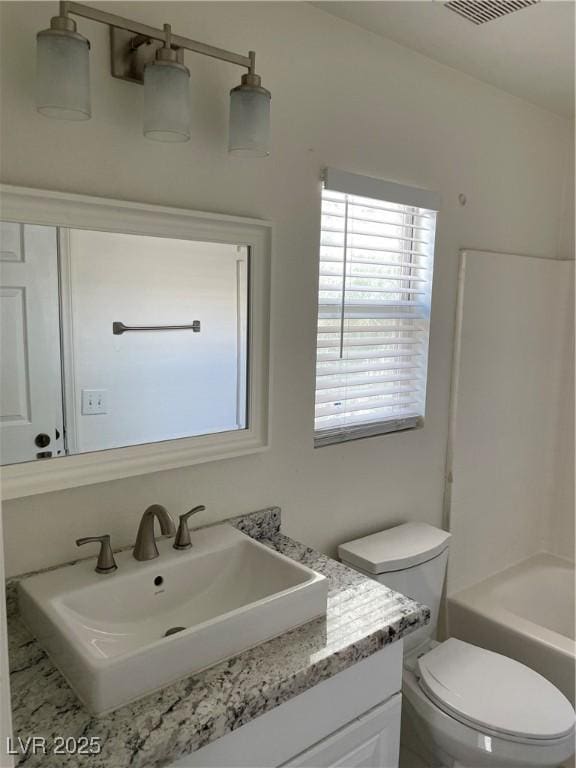 5280 Shreve Ave, Las Vegas, NV 89156 - bathroom with toilet and vanity
