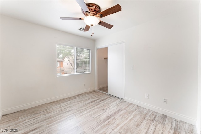 5280 Shreve Ave, Las Vegas, NV 89156 - unfurnished bedroom with light wood-type flooring, a closet, and ceiling fan