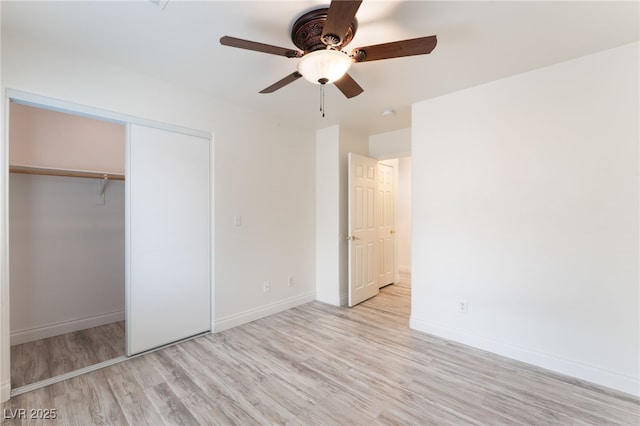5280 Shreve Ave, Las Vegas, NV 89156 - unfurnished bedroom featuring light wood-style flooring, a closet, and ceiling fan