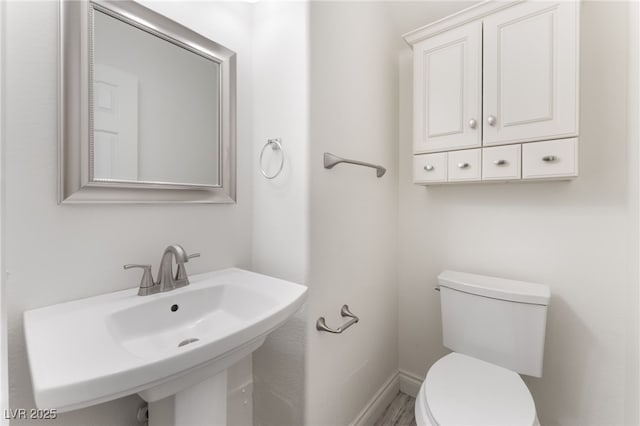 5280 Shreve Ave, Las Vegas, NV 89156 - bathroom featuring toilet and a sink