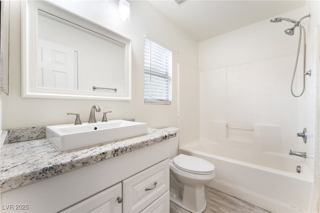 5280 Shreve Ave, Las Vegas, NV 89156 - full bath featuring vanity, wood finished floors, and  shower combination