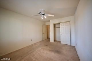 2851 S Valley View Blvd Unit 1199, Las Vegas, NV 89102 - unfurnished bedroom with a closet, carpet flooring, and a ceiling fan