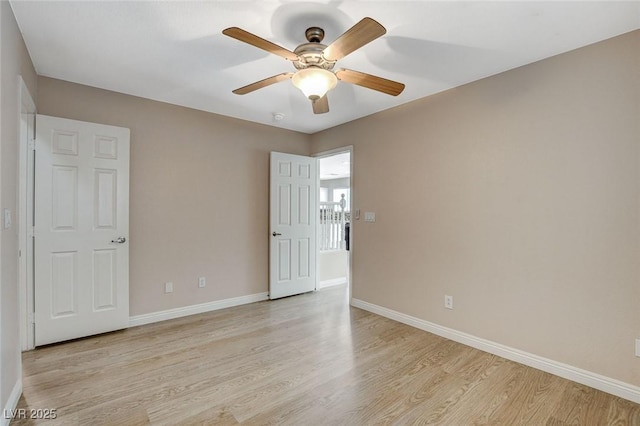 8307 Fort Hallock Ave, Las Vegas, NV 89131 - spare room featuring baseboards, light wood-style flooring, and ceiling fan