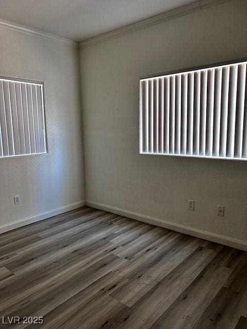 4730 E Craig Rd Unit 1148, Las Vegas, NV 89115 - empty room with ornamental molding, wood finished floors, and baseboards