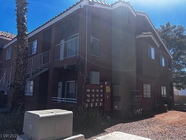 4730 E Craig Rd Unit 1148, Las Vegas, NV 89115 - view of side of home with stucco siding