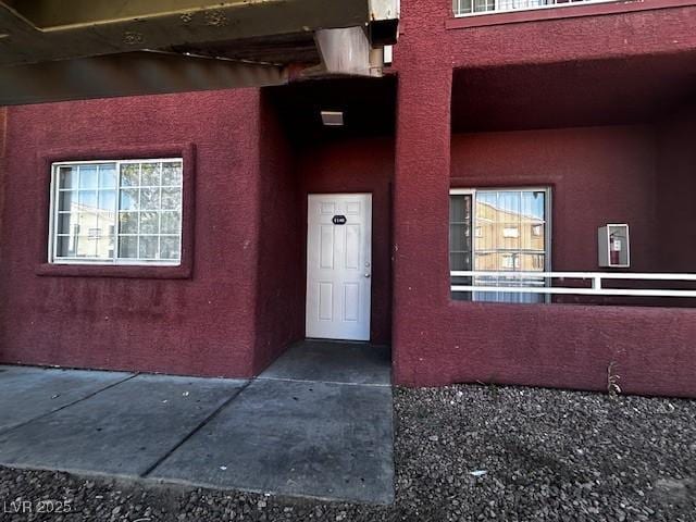 4730 E Craig Rd Unit 1148, Las Vegas, NV 89115 - doorway to property with stucco siding