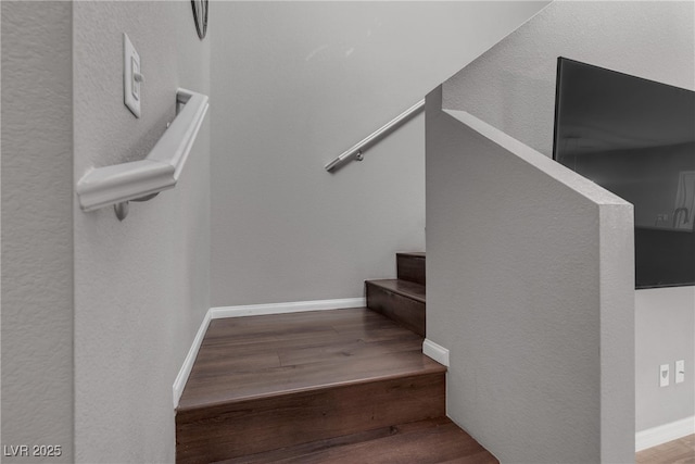 3132 Cartanda Ave, Henderson, NV 89044 - staircase featuring wood finished floors, baseboards, and a textured wall
