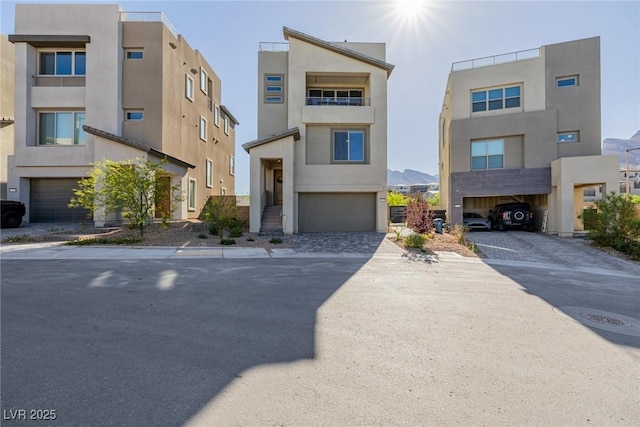 2151 Noble Perch St, Las Vegas, NV 89138 - view of front of property with stucco siding and a garage