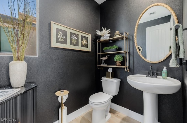 2151 Noble Perch St, Las Vegas, NV 89138 - half bath featuring wood finished floors and a textured wall