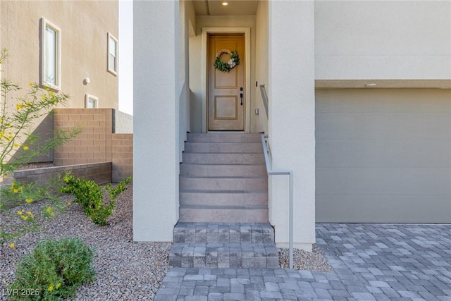 2151 Noble Perch St, Las Vegas, NV 89138 - doorway to property featuring stucco siding and a garage