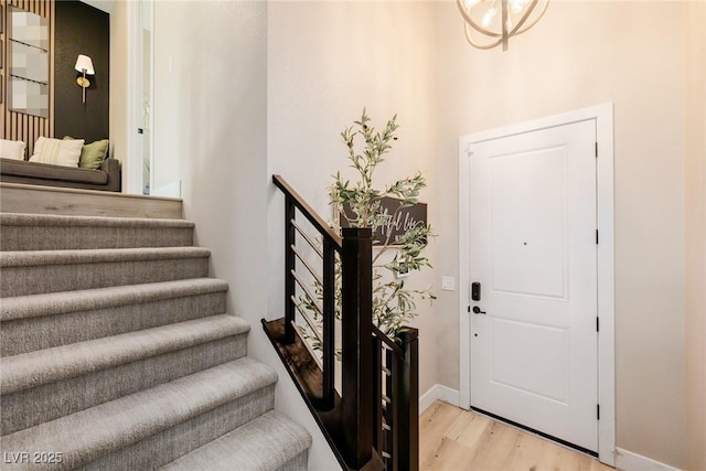 2151 Noble Perch St, Las Vegas, NV 89138 - foyer entrance featuring wood finished floors and stairs