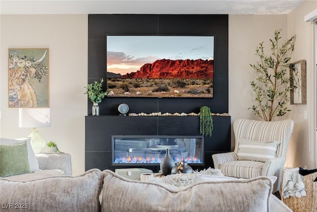 2151 Noble Perch St, Las Vegas, NV 89138 - living room with a glass covered fireplace