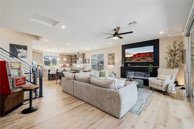 2151 Noble Perch St, Las Vegas, NV 89138 - living room with light wood-style floors, a ceiling fan, recessed lighting, and attic access