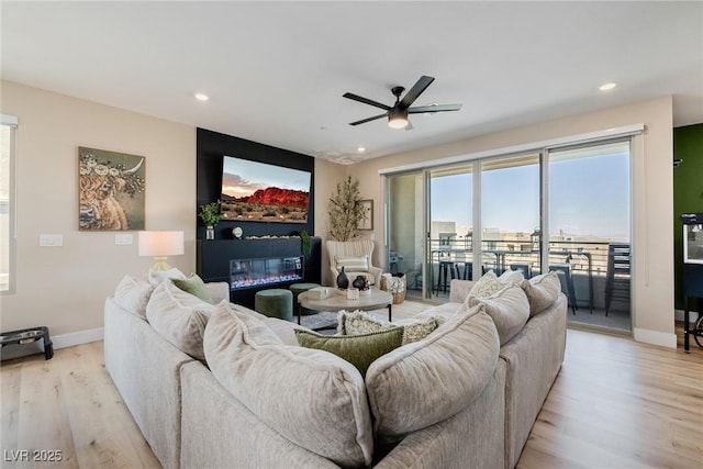 2151 Noble Perch St, Las Vegas, NV 89138 - living room with a ceiling fan, light wood finished floors, and recessed lighting