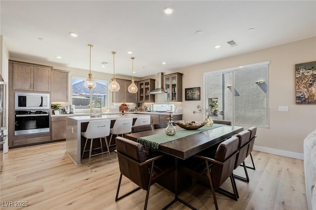 2151 Noble Perch St, Las Vegas, NV 89138 - dining space with light wood-type flooring and recessed lighting