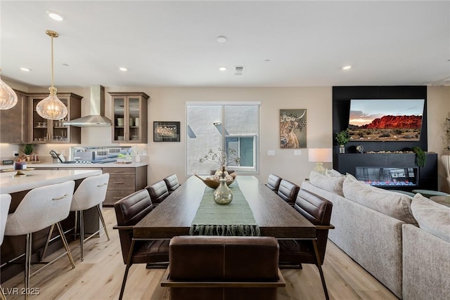 2151 Noble Perch St, Las Vegas, NV 89138 - dining area featuring light wood-style flooring and recessed lighting