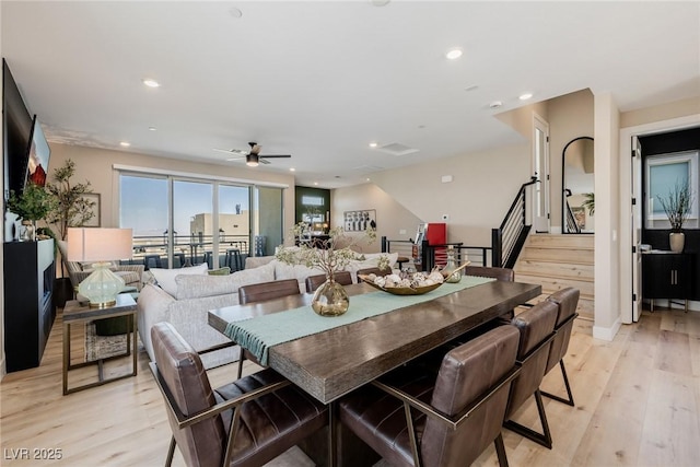 2151 Noble Perch St, Las Vegas, NV 89138 - dining area featuring stairway, light wood-style floors, ceiling fan, and recessed lighting
