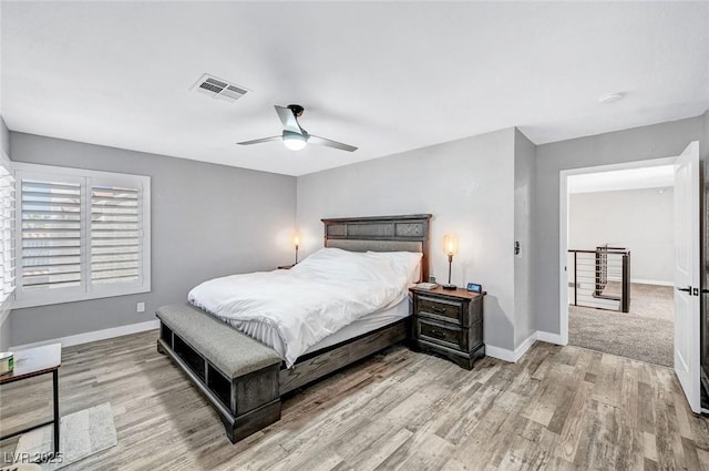 8316 Maplestar Rd, Las Vegas, NV 89128 - bedroom featuring baseboards, wood finished floors, and ceiling fan