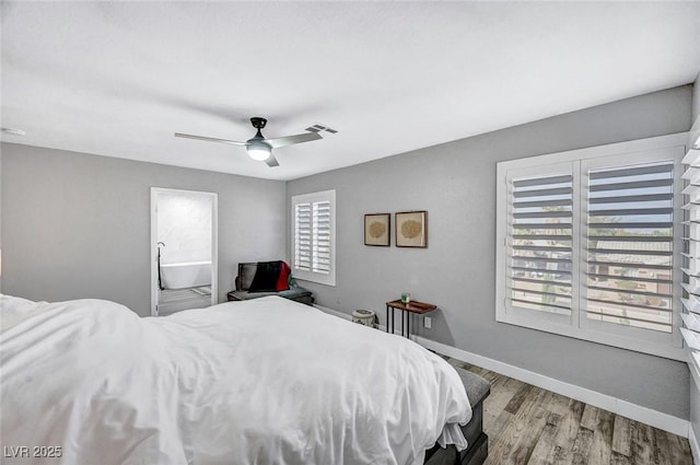 8316 Maplestar Rd, Las Vegas, NV 89128 - bedroom with wood finished floors, baseboards, and ceiling fan