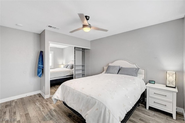 8316 Maplestar Rd, Las Vegas, NV 89128 - bedroom featuring light wood-style floors, baseboards, and ceiling fan