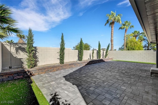 8316 Maplestar Rd, Las Vegas, NV 89128 - fenced backyard with a patio area