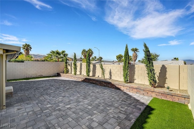 8316 Maplestar Rd, Las Vegas, NV 89128 - fenced backyard featuring a patio area