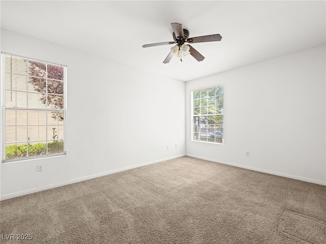 231 W Horizon Ridge Parkway Unit 212, Henderson, NV 89012 - empty room featuring carpet flooring, baseboards, and a ceiling fan