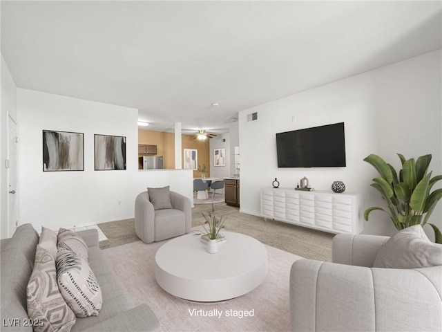 231 W Horizon Ridge Parkway Unit 212, Henderson, NV 89012 - living area featuring light colored carpet and baseboards