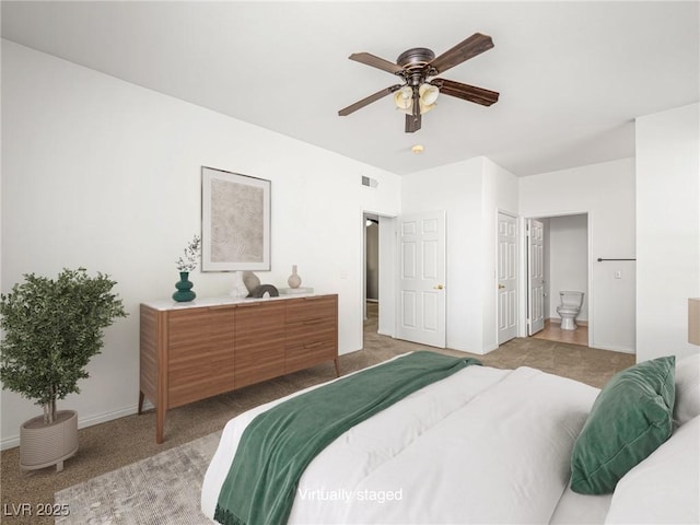 231 W Horizon Ridge Parkway Unit 212, Henderson, NV 89012 - bedroom featuring carpet flooring, baseboards, and ensuite bath